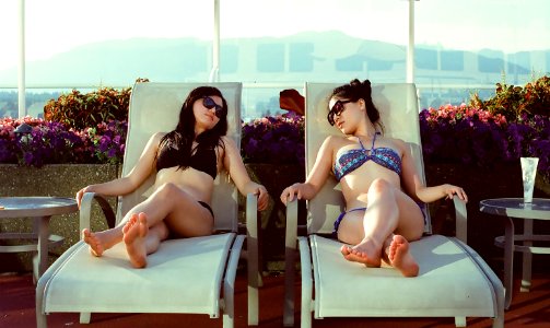 Friends Relaxing by the Pool photo