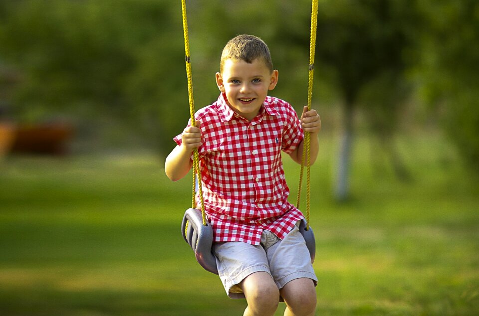 Swing child happy photo