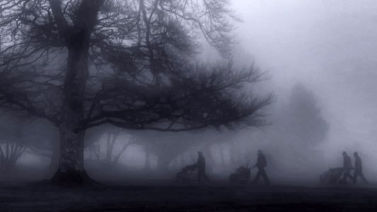 Golfers in the fog