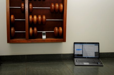 Soda Hall abacus with laptop and smartphone - closeup photo