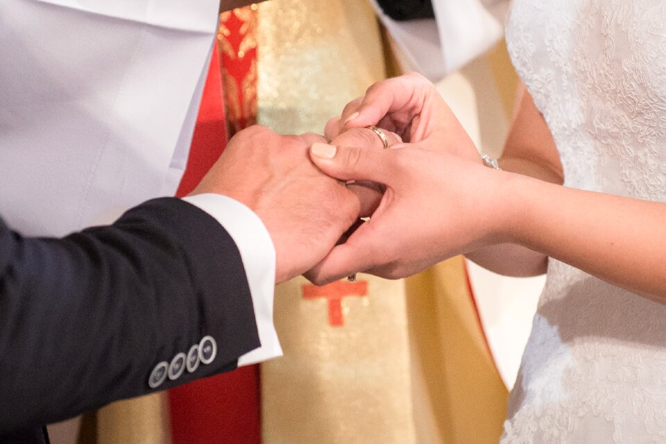 Wedding rings oath young couple