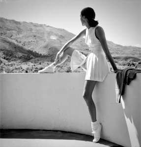 Woman wearing tennis outfit (1947), by Toni Frissell (1907 - 1988)