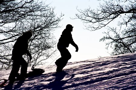 Winter tobogganing children