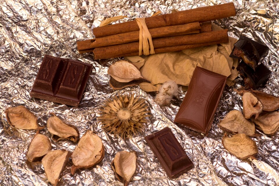 Still life cinnamon sticks chocolate