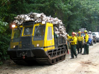 Bombardier laden with hose