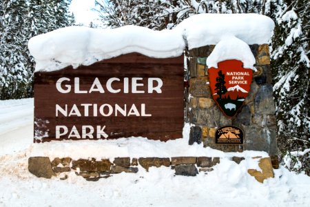 Glacier Entrance Sign in Snow photo