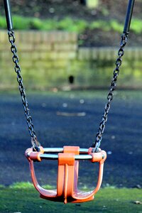 Swinging fun outdoors photo