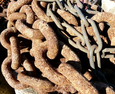 Iron links of the chain rusted