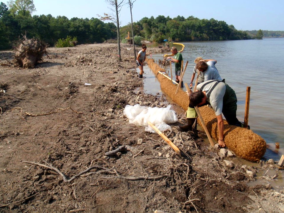 AmeriCorp volunteers assisting with Lake Tecumseh project