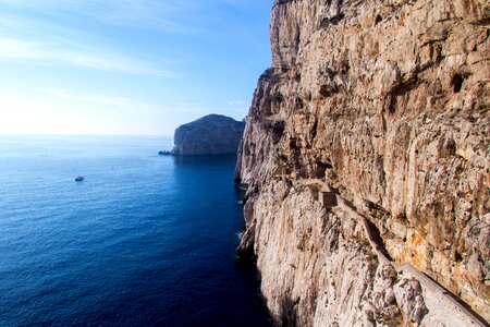 Rock boat cliff photo