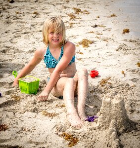 Beach sand playing blond photo