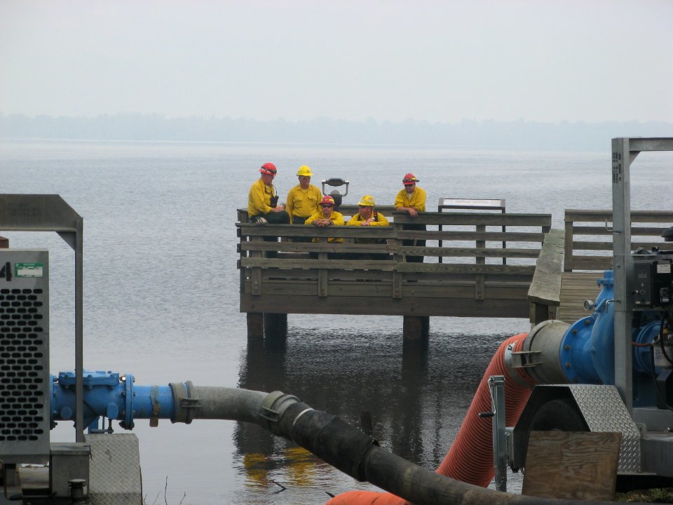 Firefighters on Lake Drummond