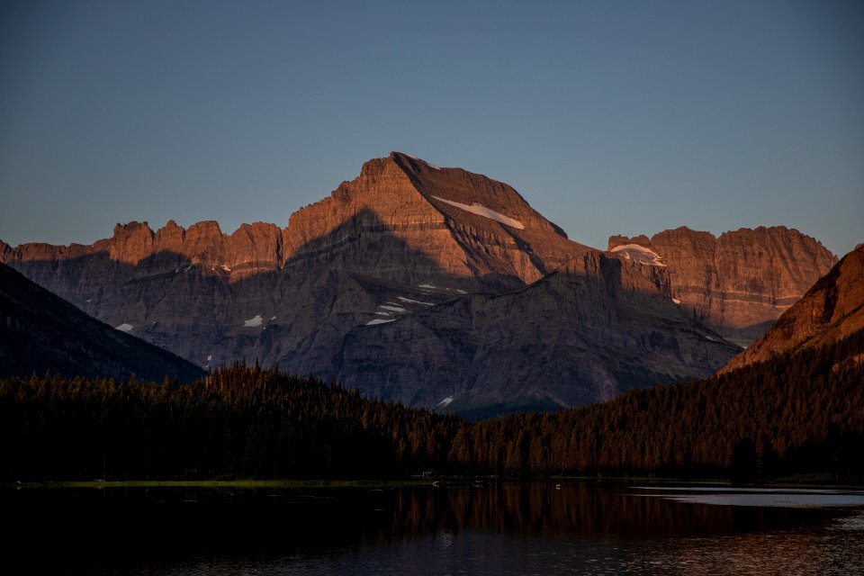 Sunrise at Swiftcurrent Lake as seen from the Many Glacier Hotel.