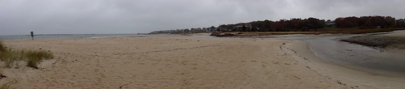 Town beach and residents across from Round Hill salt marsh restoration work photo