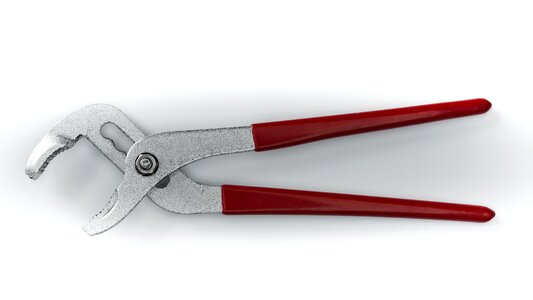 Plumber pliers red photo