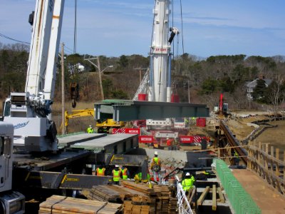 Heavy equipment working on bridge construction at the Muddy Creek wetland restoration project site