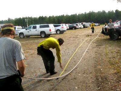 Hose roll AmeriCorps NCCC team