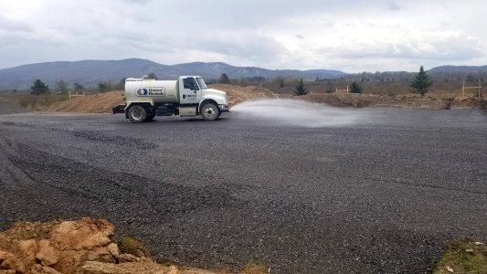 Water being applied to gravel lift