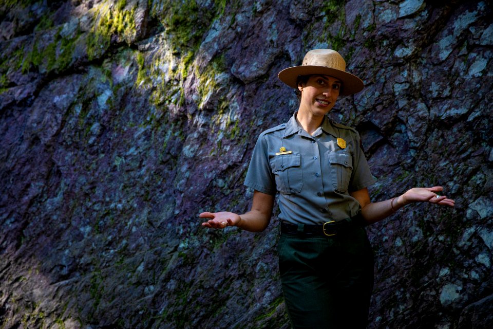 A park ranger enjoying a hike to Avalanche Lake.
