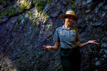 A park ranger enjoying a hike to Avalanche Lake.