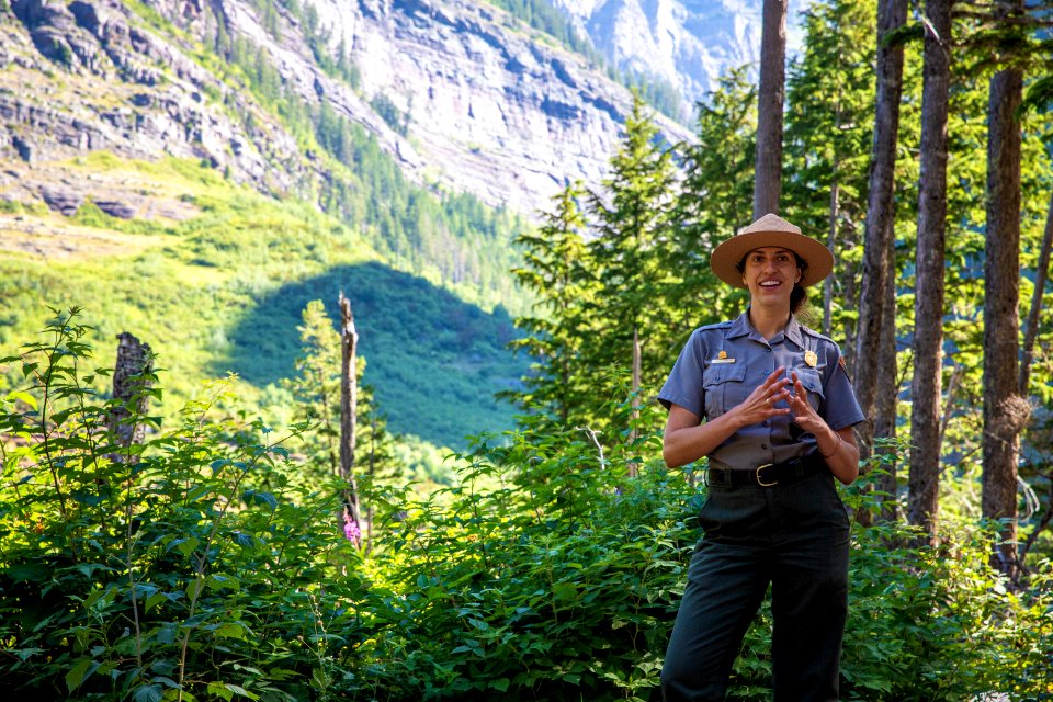 A park ranger enjoying a hike to Avalanche Lake.