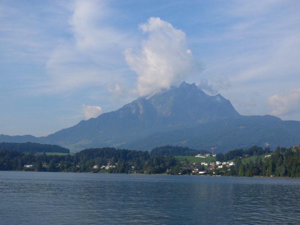 Travelling on the Lake Lucerne aboard the steam ship DS Uri