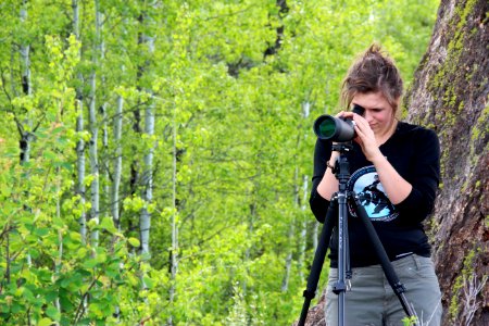Student hard at work looning with spotting scope