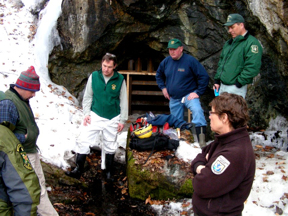 Biologists gather at mine entrance