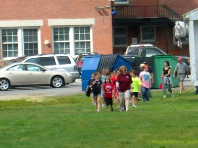 Kids arrive at local stream photo