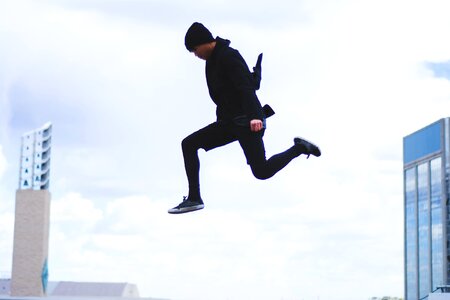 Boy male jumping photo