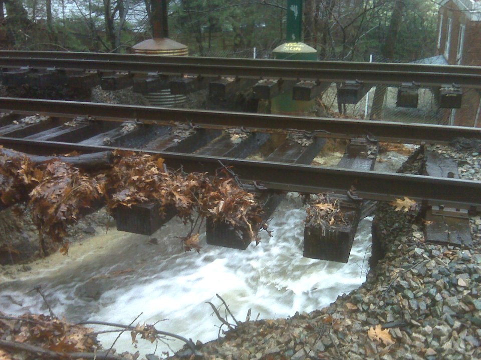 Flood Waters Cause Sinkhole Washout on MBTA Green Line D Branch in Newton, March 15, 2010