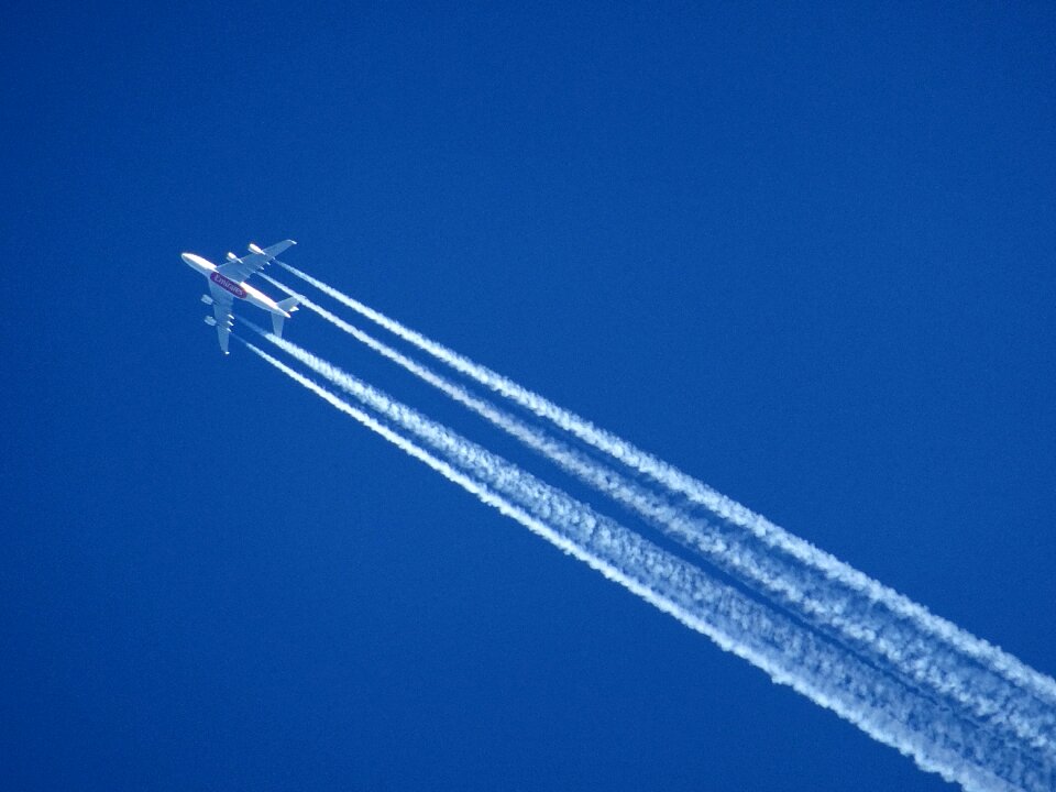 Air flying partly cloudy