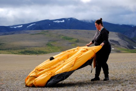 Cait sets up her tent