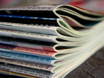 Reading journals newspapers photo