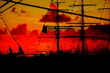 RED SAILS IN A SUNSET