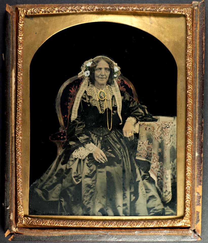 Quarter plate hand coloured ambrotype of an older lady