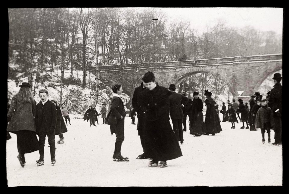 Ice skating on a frozen river, ca 1900