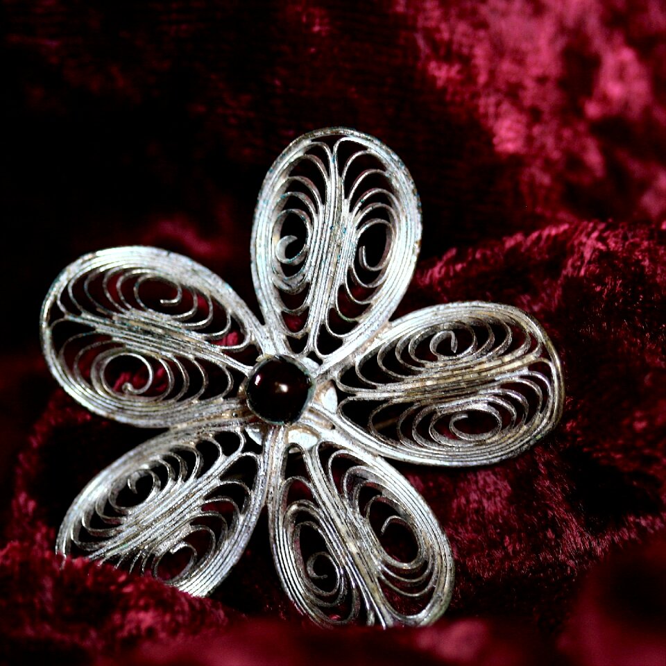 Garnet filigree badges