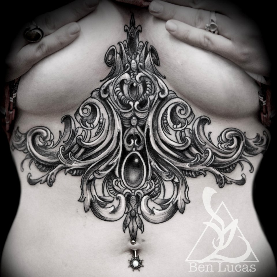 aishlins-sternum-underboob-filigris-tattoo-in-black-and-grey-by-ben-lucas-at-eye-of-jade-tattoo-chico-ca