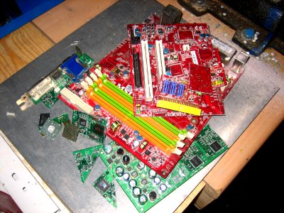 Pieces of Nvidia GeForce 4 Ti Graphics Card and MSI K9A2 Neo (CF) Mainboard 2/3 photo