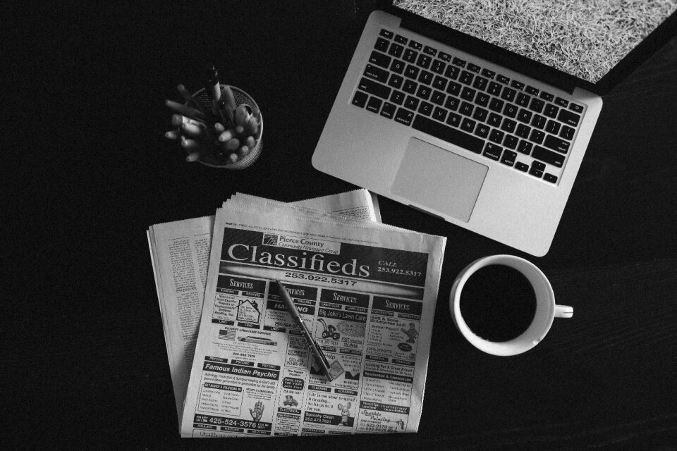 Work newspaper coffee
