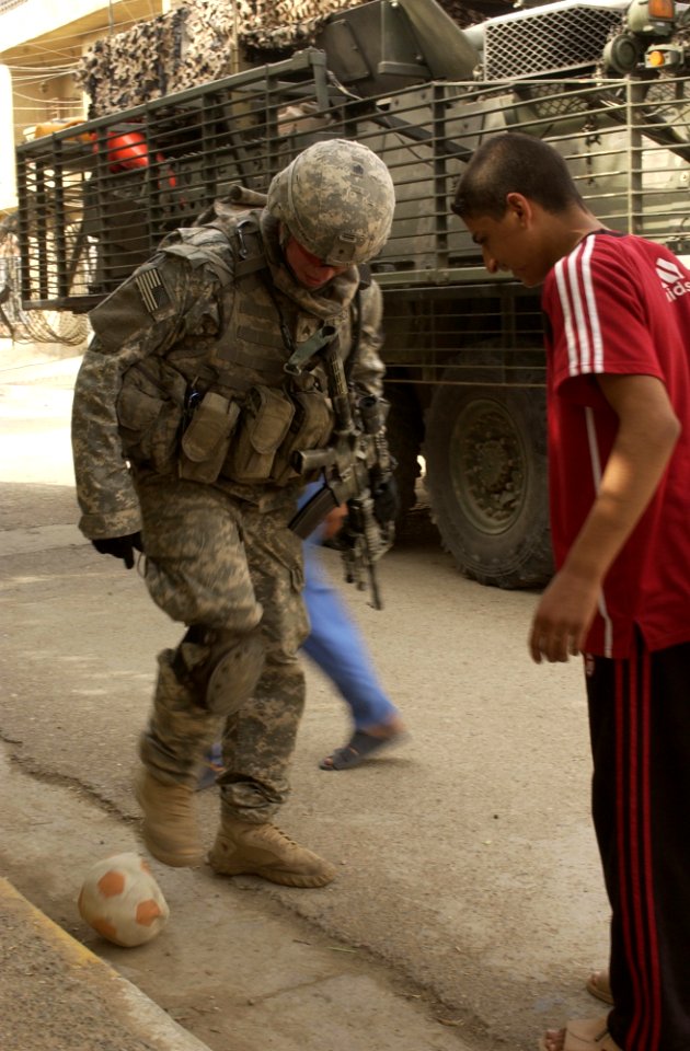 Public Domain: Playing Soccer in Iraq by Elisha Dawkins, US Army, May 3, 2007 (DOD 070403-A-3887D-139)