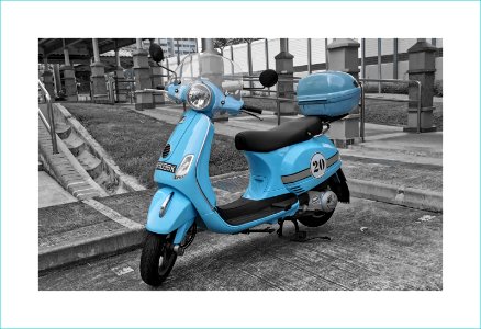 Bright light blue scooter photo