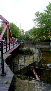 Entrance lock to Surrey Commercial Docks with old lock gates and bascule bridge