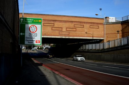 Railway crosses Coulsdon relief road at Coulsdon Town station photo