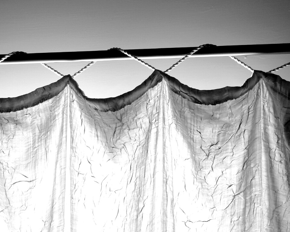 Rod black and white drapery