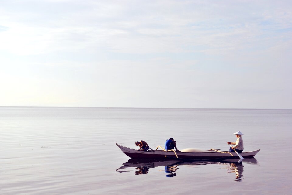 Water calm fishermen photo