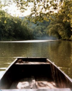 misc boat on still river photo