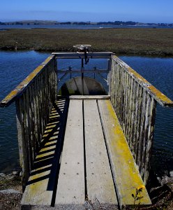 A dock with a steering wheel.
