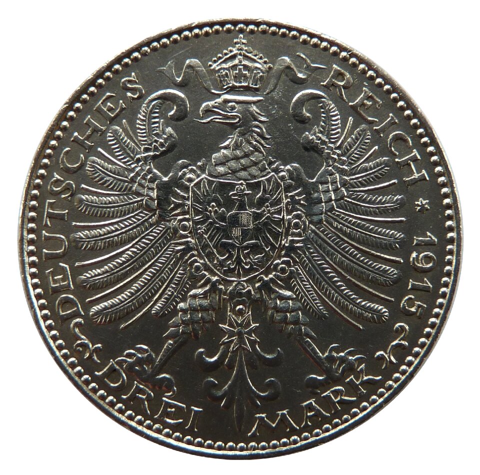 Numismatics face metal